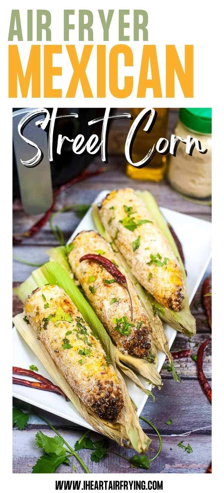 three ears of mexican street corn on a plate with text overlay