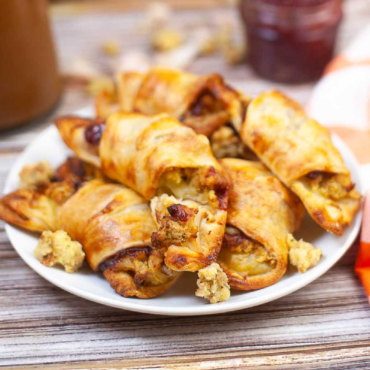 stuffed leftover turkey crescent rolls on a white plate.
